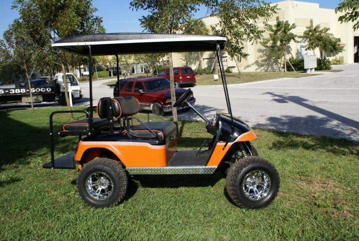 Customized orange golf cart Kendall